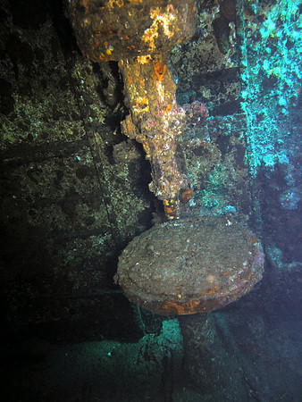 The wreck of Marcus, inside, a drill at the machinist's workshop