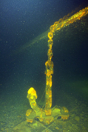 The right side anchor hanging from the side, sitting at the bottom.
